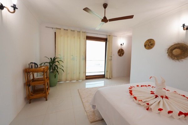 Ocean view room with romantic petal decoration